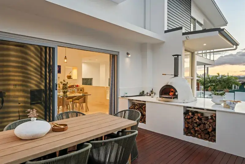 Residential builders standing inside a newly renovated home